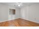 Bedroom features hardwood floors, one window, and a ceiling fan at 4520 Coquina Harbour Dr. # F-3, Little River, SC 29566