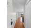 Bright condo hallway leads to an open kitchen and living area with views of the coastal marsh at 4520 Coquina Harbour Dr. # F-3, Little River, SC 29566