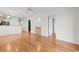 Open-concept living area with stylish wood flooring, abundant natural light, and neutral color palette at 4520 Coquina Harbour Dr. # F-3, Little River, SC 29566