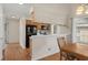 Efficient kitchen with black appliances, natural cabinets, and breakfast bar seating overlooking the dining room at 4940 Windsor Green Way # 301, Myrtle Beach, SC 29579