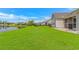 Expansive backyard with a tranquil pond view at 5 Coffee Mill Creek Ln., Carolina Shores, NC 28467