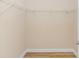 Walk-in closet with wood flooring and wire shelving at 5 Coffee Mill Creek Ln., Carolina Shores, NC 28467