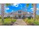 Stunning clubhouse with elegant architectural design and lush landscaping providing a welcoming entrance at 5 Coffee Mill Creek Ln., Carolina Shores, NC 28467