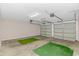 Spacious two-car garage with ample room for parking and storage at 5 Coffee Mill Creek Ln., Carolina Shores, NC 28467