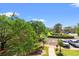 Green landscape with parking viewed from balcony at 500 Myrtle Greens Dr. # D, Conway, SC 29526