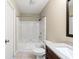 Bathroom featuring a shower-tub combo and a tiled floor at 500 Myrtle Greens Dr. # D, Conway, SC 29526