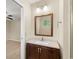 Bathroom featuring a mirror, vanity with sink and view into the bedroom at 500 Myrtle Greens Dr. # D, Conway, SC 29526
