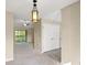 Dining area with stylish lighting and a sliding door to the balcony at 500 Myrtle Greens Dr. # D, Conway, SC 29526