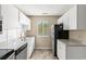 Bright kitchen with stainless steel appliances and granite countertops at 500 Myrtle Greens Dr. # D, Conway, SC 29526