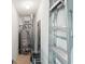 Utility room featuring a water heater, shelving and a ladder at 500 Myrtle Greens Dr. # D, Conway, SC 29526