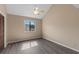 Bright bedroom with gray floors, neutral walls, a ceiling fan, and a window at 510 Fairwood Lakes Dr. # 19-Q, Myrtle Beach, SC 29588