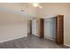 Bedroom featuring modern gray floors, neutral walls, and a closet with bi-fold doors at 510 Fairwood Lakes Dr. # 19-Q, Myrtle Beach, SC 29588