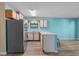 An open kitchen features modern appliances, sleek countertops, and seamless transition to the dining area at 510 Fairwood Lakes Dr. # 19-Q, Myrtle Beach, SC 29588