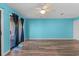 Bright living room with access to an outdoor patio, modern flooring and a ceiling fan at 510 Fairwood Lakes Dr. # 19-Q, Myrtle Beach, SC 29588
