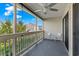 Relaxing screened porch with ceiling fan and chairs, offering a peaceful outdoor space at 510 Fairwood Lakes Dr. # 19-Q, Myrtle Beach, SC 29588