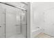 Contemporary bathroom featuring a glass shower and separate soaking tub at 5146 Fairmont Ln., Myrtle Beach, SC 29579
