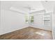Bright bedroom with hardwood floors, abundant natural light, and a ceiling fan at 5146 Fairmont Ln., Myrtle Beach, SC 29579