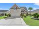 Charming home featuring a well-manicured lawn and a spacious driveway, offering curb appeal at 5146 Fairmont Ln., Myrtle Beach, SC 29579