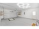 Spacious garage with automatic door, shelving, and a door to the outside at 5146 Fairmont Ln., Myrtle Beach, SC 29579
