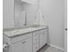 Bathroom with dual sinks and granite countertops, enhancing the functional and aesthetic appeal at 5310 Knobcone Loop # B, Myrtle Beach, SC 29577