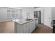 Modern kitchen island with stainless steel appliances and granite countertops at 5310 Knobcone Loop # B, Myrtle Beach, SC 29577