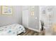 Bedroom with a single bed, coastal-themed decor, and a view to the bathroom with shower at 5406 Sweetwater Blvd. # 5406, Murrells Inlet, SC 29576