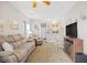 Cozy living room featuring comfortable seating, a dining area, and a glimpse of the kitchen at 5406 Sweetwater Blvd. # 5406, Murrells Inlet, SC 29576