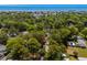 An aerial view shows the home nestled among mature trees and close proximity to the ocean at 6001 - 1732 S Kings Hwy., Myrtle Beach, SC 29575