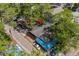 An aerial view shows this cozy beach house nestled among mature trees on a narrow street at 6001 - 1732 S Kings Hwy., Myrtle Beach, SC 29575