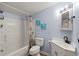 Bathroom with shower, toilet, vanity, and nautical decor at 6001 - 1732 S Kings Hwy., Myrtle Beach, SC 29575