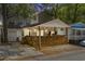Charming home with a beautiful wooden porch and string lights, perfect for relaxing outdoors at 6001 - 1732 S Kings Hwy., Myrtle Beach, SC 29575