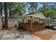 Charming home with a spacious wooden porch, perfect for enjoying the outdoors at 6001 - 1732 S Kings Hwy., Myrtle Beach, SC 29575