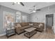 Comfortable living room featuring neutral tones, ample seating, and large windows for natural light at 6001 - 1732 S Kings Hwy., Myrtle Beach, SC 29575