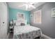 Bedroom features a bed with a patterned comforter and bright natural light at 6001-1833 S Kings Hwy., Myrtle Beach, SC 29575