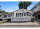 Inviting home with white railings and black shutters for a neat, coastal vibe at 6001-1833 S Kings Hwy., Myrtle Beach, SC 29575