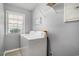 Practical laundry room with a washer, dryer, window, and storage at 6001-1833 S Kings Hwy., Myrtle Beach, SC 29575