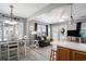Bright, open-concept living space with dining area, kitchen, and comfortable seating at 6001-1833 S Kings Hwy., Myrtle Beach, SC 29575