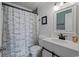 Well-maintained bathroom with modern fixtures, a toilet, and a shower behind a curtain at 613 S Ocean Blvd. # N3, North Myrtle Beach, SC 29582