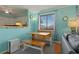 Cozy dining area featuring built-in bench seating and natural light from the nearby window at 613 S Ocean Blvd. # N3, North Myrtle Beach, SC 29582