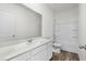 Well-lit bathroom featuring a modern vanity, mirror, tub and shower showcasing functionality and style at 622 Castillo Dr., Loris, SC 29569