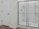 Modern bathroom showcasing a glass shower, white fixtures, and sleek, minimalist design at 622 Castillo Dr., Loris, SC 29569