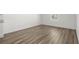 Bedroom with neutral paint and wood look flooring, offering serene views at 622 Castillo Dr., Loris, SC 29569