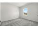 Bright bedroom with a window showcasing natural light and carpet providing comfort and style at 622 Castillo Dr., Loris, SC 29569
