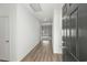 Bright entryway featuring wood-look flooring and a view to the main living area and water outside at 622 Castillo Dr., Loris, SC 29569