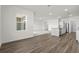 Bright, open living room with wood look flooring, filled with natural light at 622 Castillo Dr., Loris, SC 29569