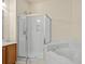 The bathroom has a glass shower, and soaking tub at 6244 Catalina Dr. # 511, North Myrtle Beach, SC 29582