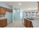 Kitchen shows matching appliances, cabinets, and countertops with tile floors and mosaic backsplash at 6244 Catalina Dr. # 511, North Myrtle Beach, SC 29582