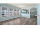 Bright living room with a large window, light wood floors, and light blue walls at 6244 Catalina Dr. # 511, North Myrtle Beach, SC 29582
