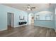 Living room features an open floor plan, hard wood floors, bright paint, and mounted television at 6244 Catalina Dr. # 511, North Myrtle Beach, SC 29582