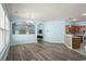 Open-concept living room with wood flooring, and light blue walls at 6244 Catalina Dr. # 511, North Myrtle Beach, SC 29582